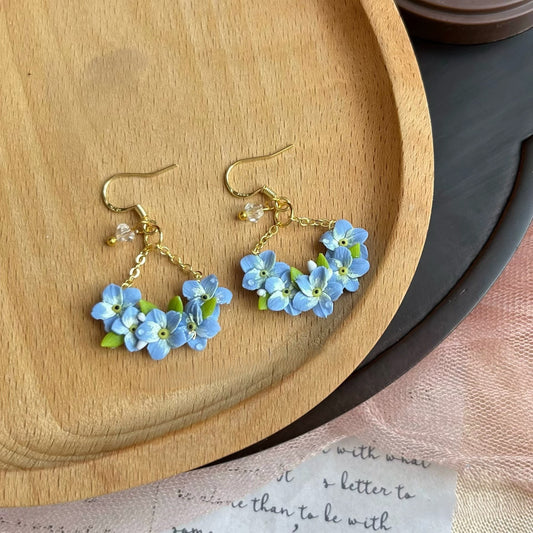 Handmade Blue Forget Me Not Polymer Clay Dangle Earrings, Crystal Chain Floral Wreath Jewelry